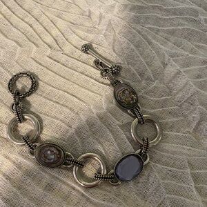 Lia Sophia purple amethyst and abalone bracelet.​